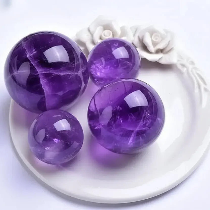 Amethyst sphere styled on a desk or shelf