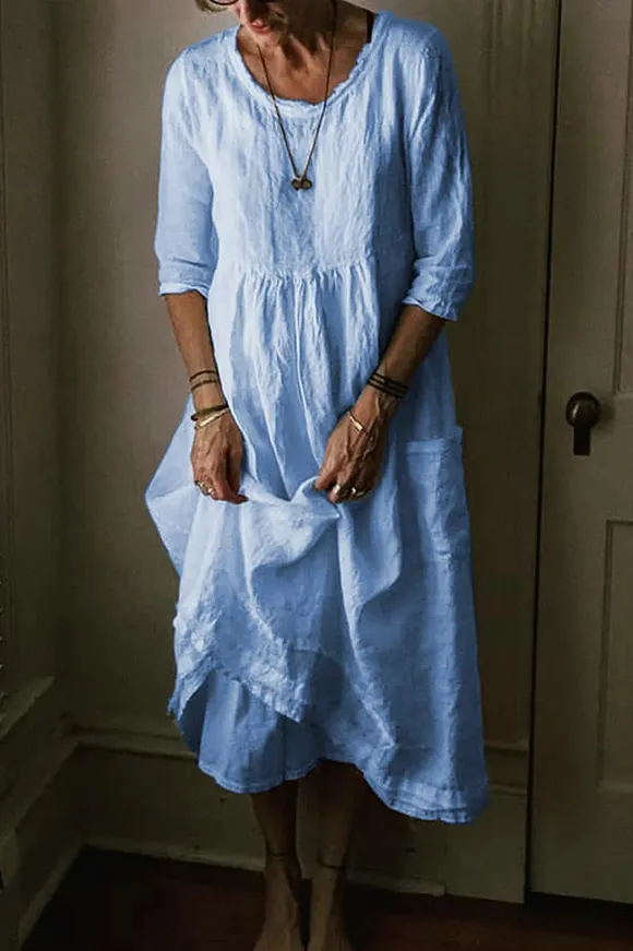 Solid Color Midi Dress with a Round Neck and 3/4 Sleeves